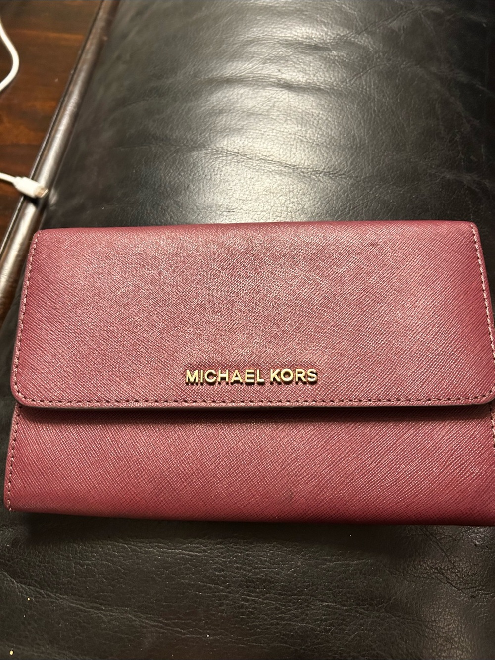 Michael Kors Plum Leather Fold Wallet with Gold Logo